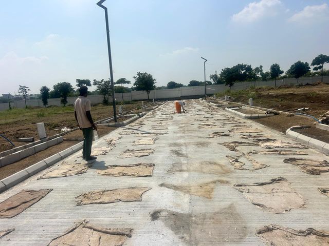 CC Road Wet Curing with Hessian Sacks