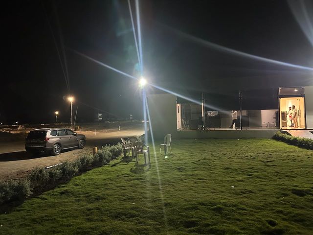 Site Welcome Office & Landscaped Lawn by Night
